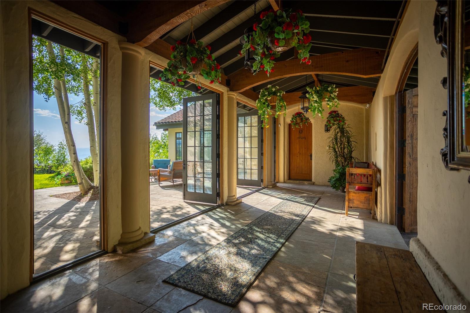 6903 Bellyache Ridge Road Wolcott, CO 81655 - Photo 11 of 50 a view of a porch with wooden floor and outdoor space