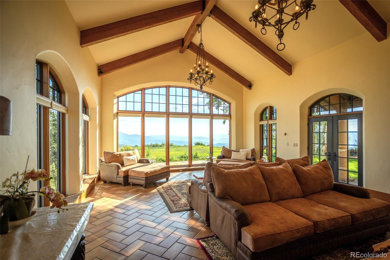 6903 Bellyache Ridge Road Wolcott, CO 81655 - Photo 13 of 50 a living room with furniture and a large window