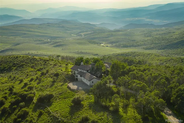 a view of an ocean and mountain