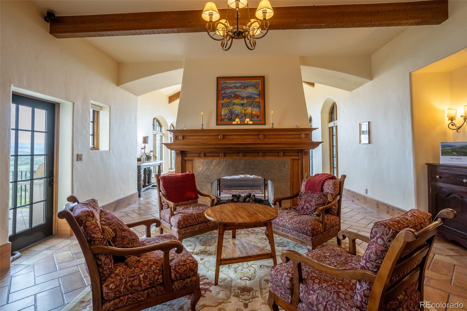 6903 Bellyache Ridge Road Wolcott, CO 81655 - Photo 21 of 50 a living room with furniture and a fireplace