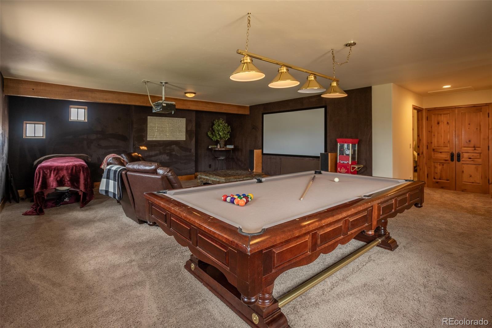 6903 Bellyache Ridge Road Wolcott, CO 81655 - Photo 44 of 50 a room with pool table and a flat screen tv