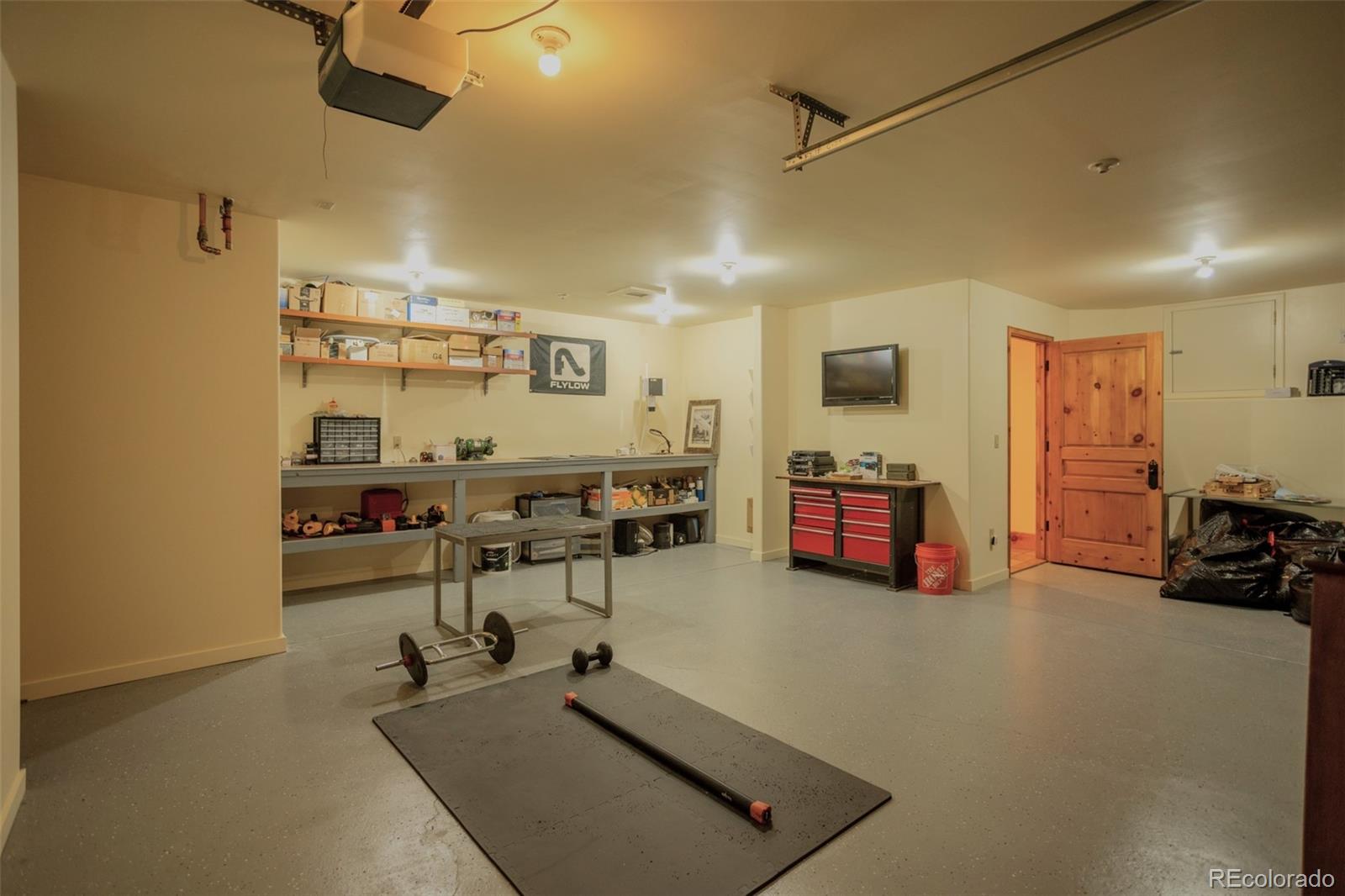 6903 Bellyache Ridge Road Wolcott, CO 81655 - Photo 46 of 50 a room with gym equipment