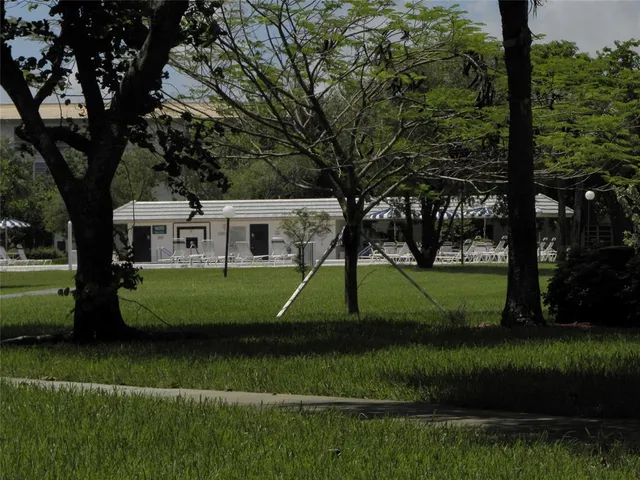 a kitchen with a sink and a microwave