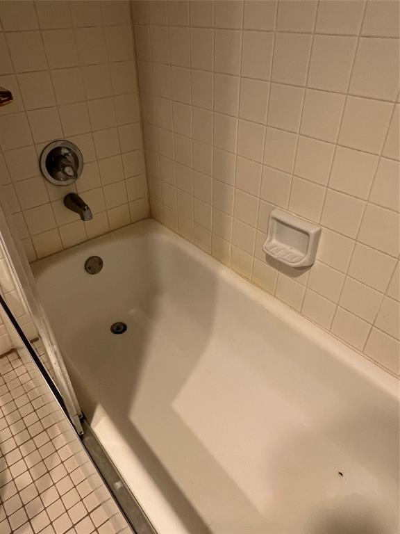 1605 Abaco Drive, Unit 1605 J1 Coconut Creek, FL 33066 - Photo 42 of 71 a bathroom with a tub