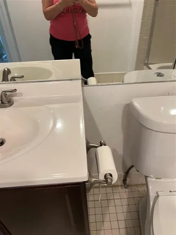 a kitchen with cabinets and appliances