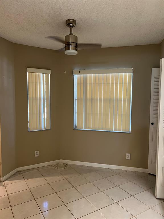 1605 Abaco Drive, Unit 1605 J1 Coconut Creek, FL 33066 - Photo 56 of 71 a view of an empty room and window