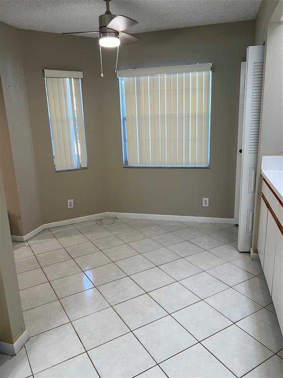 1605 Abaco Drive, Unit 1605 J1 Coconut Creek, FL 33066 - Photo 57 of 71 a view of an empty room with a window