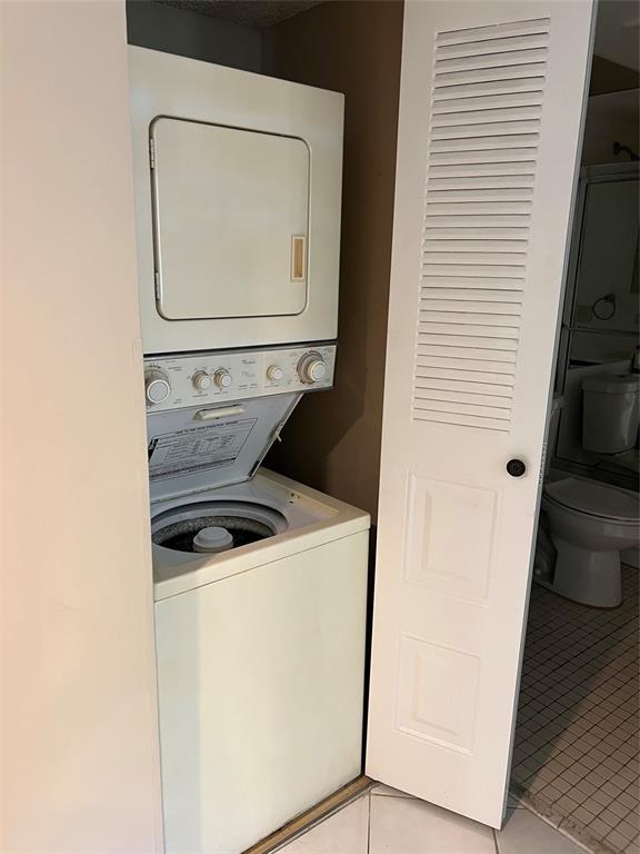 1605 Abaco Drive, Unit 1605 J1 Coconut Creek, FL 33066 - Photo 7 of 71 a utility room with dryer and washer