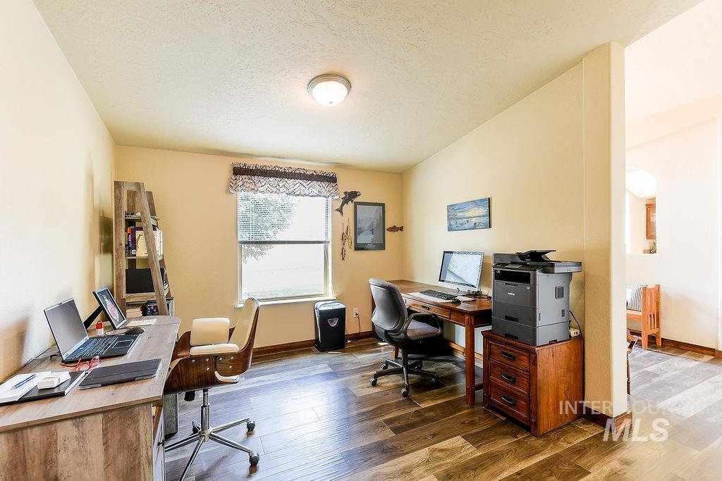 414 South Garfield Street Genesee, ID 83832 - Photo 29 of 50 Office with wood finished floors and a textured ceiling