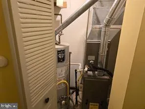 a bathroom with a toilet a sink and bathtub