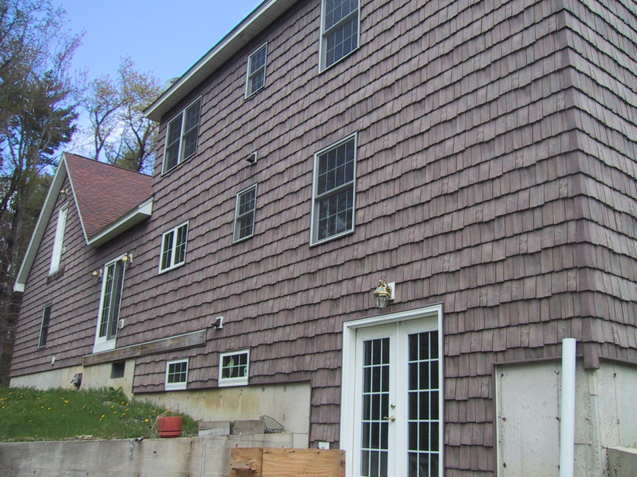 100 New Hartford Road Sandisfield, MA 01255 - Photo 2 of 2 a view of a brick house with a street