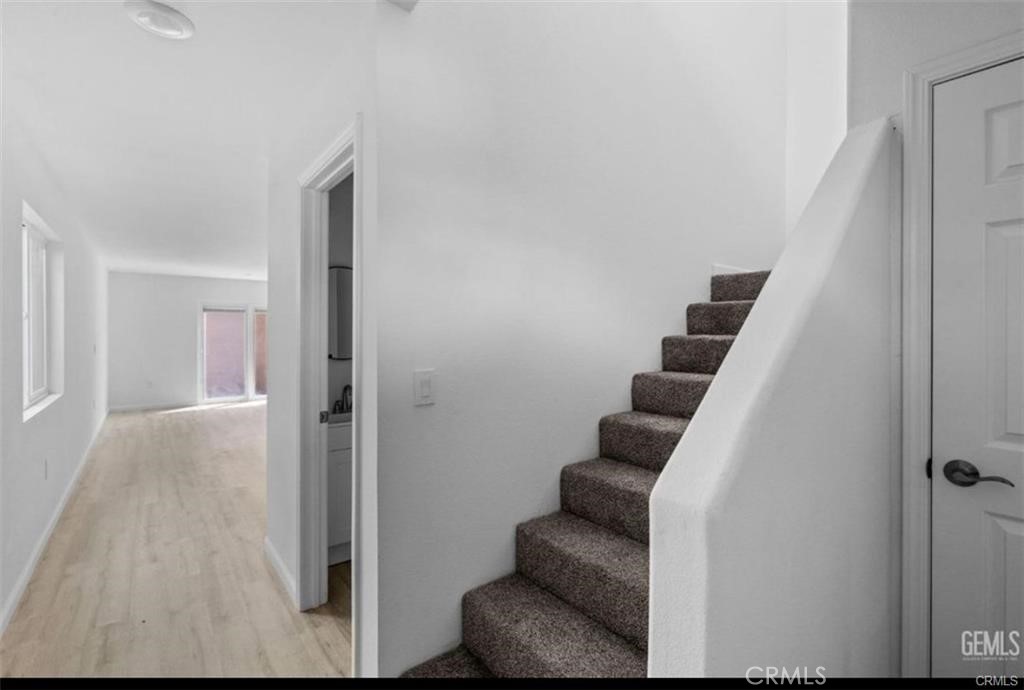 1413 Oregon Street Bakersfield, CA 93305 - Photo 4 of 8 a view of entryway and hall with wooden floor