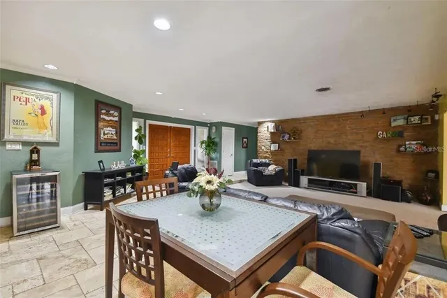 a view of a livingroom with furniture and window