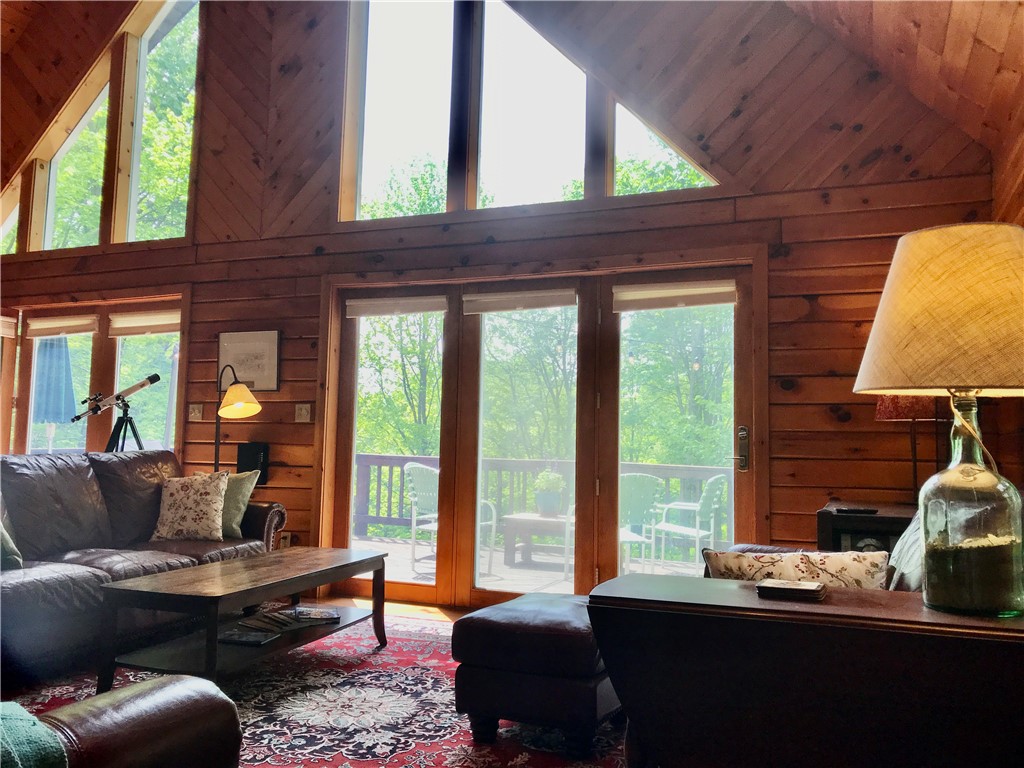207 Pheasant Run Road Middlefield, NY 13326 - Photo 10 of 44 Serene views through fabulous windows