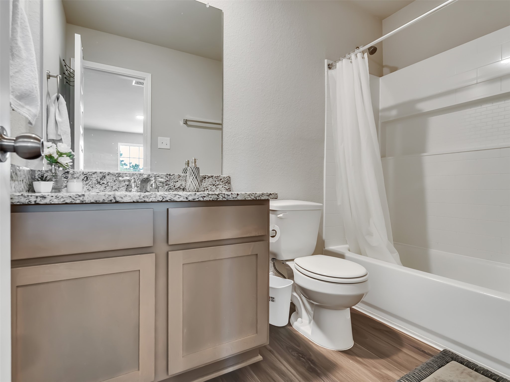 2416 Bluefish Court Conroe, TX 77384 - Photo 21 of 45 a bathroom with a sink toilet and shower