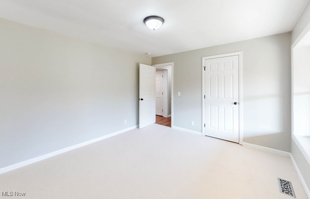 1048 Rolling Meadows Road Akron, OH 44333 - Photo 29 of 41 Lower level bedroom