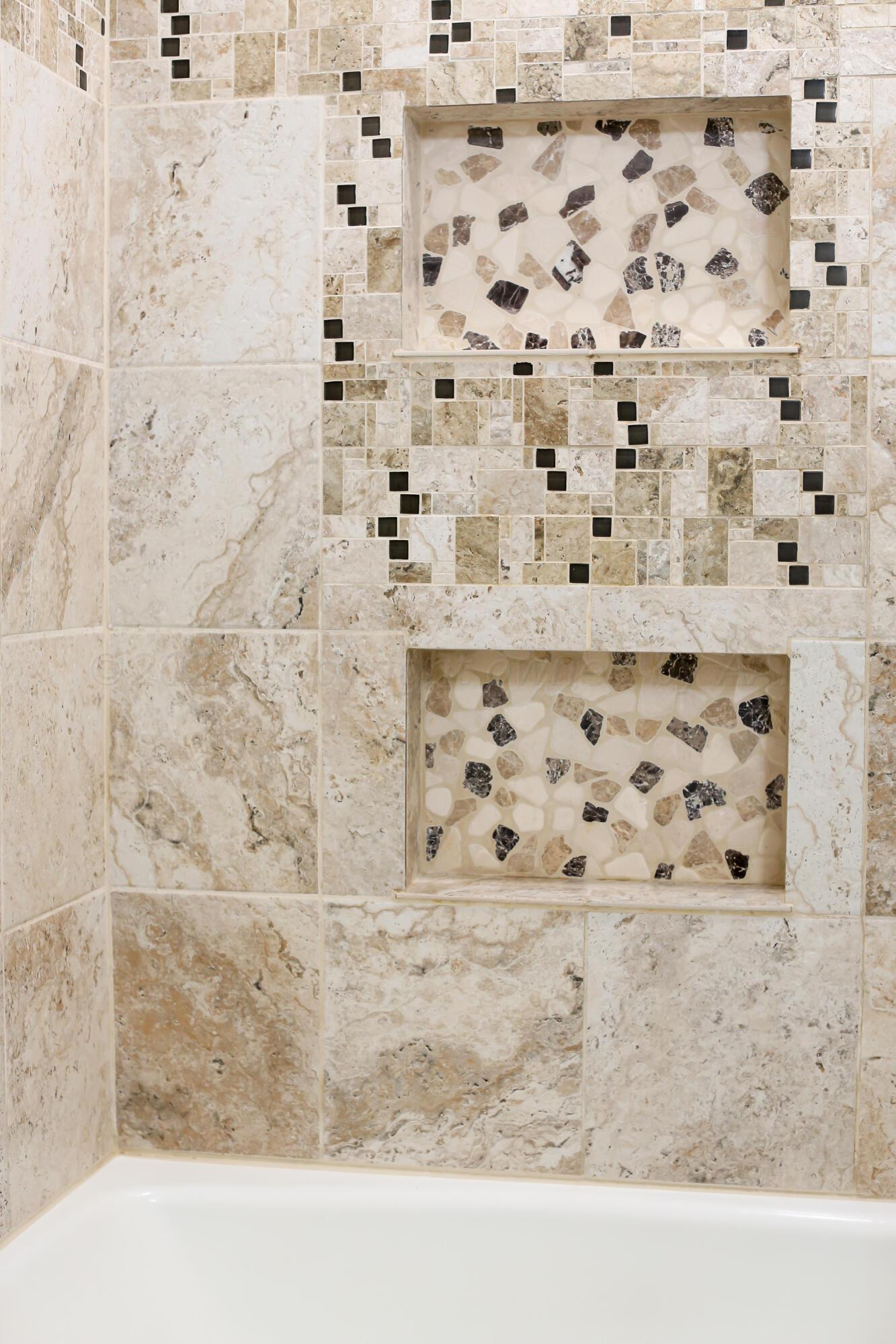 5317 Capulin Lane Amarillo, TX 79110 - Photo 19 of 19 a bathroom with a shower