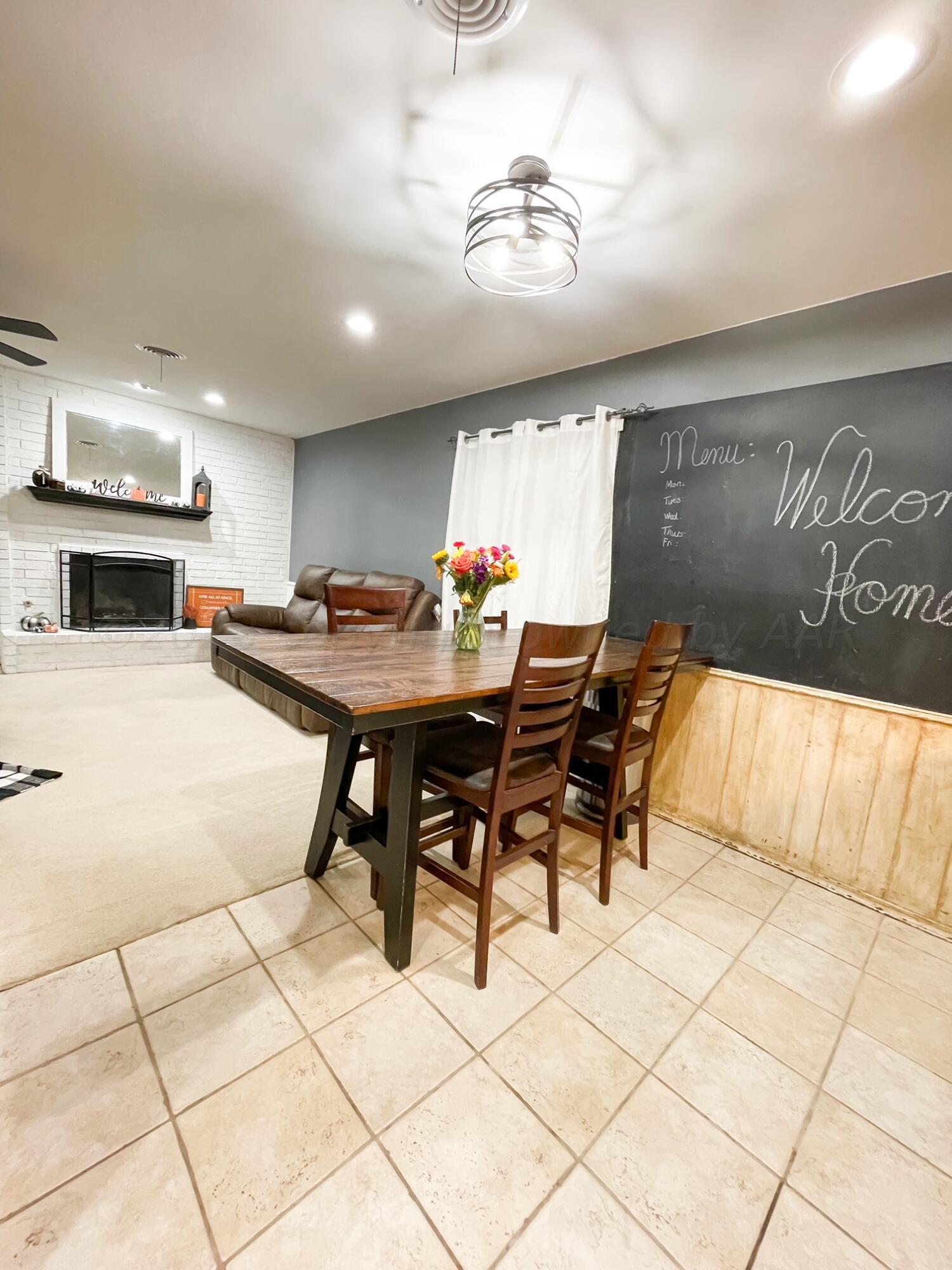 5317 Capulin Lane Amarillo, TX 79110 - Photo 8 of 19 a view of a dining area with furniture