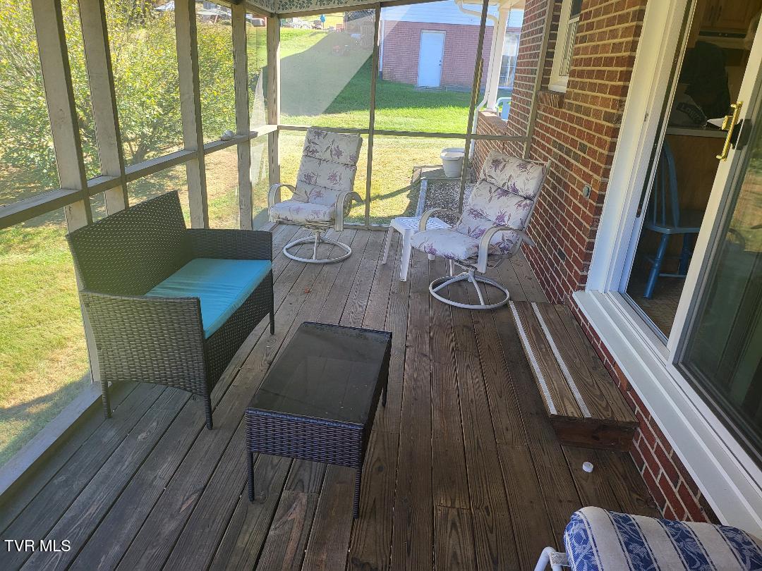 135 Unaka Subdivision Road Elizabethton, TN 37643 - Photo 7 of 21 Unaka Screened in Porch