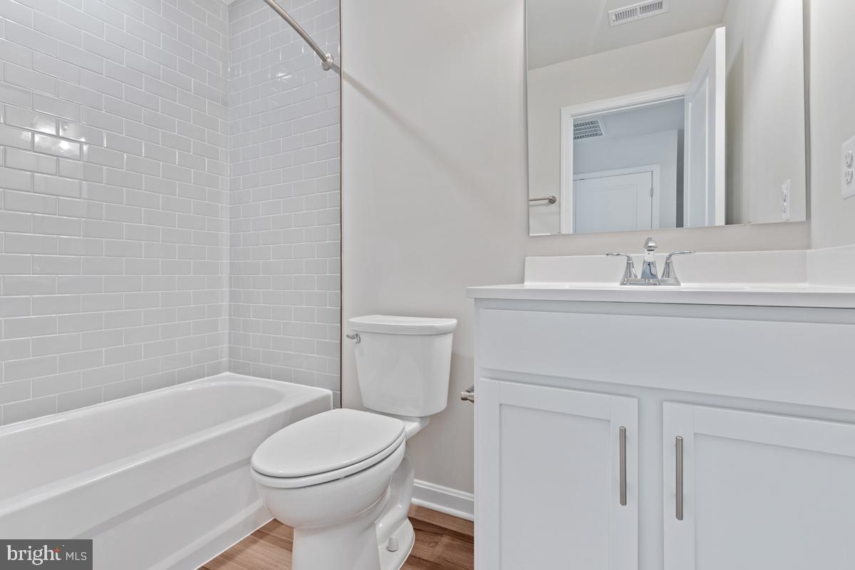 116 Hopkins Street Ranson, WV 25438 - Photo 20 of 30 a bathroom with a sink toilet and shower