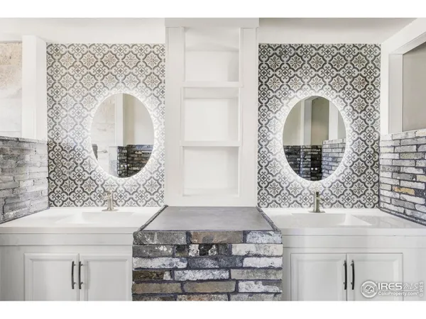 a view of an empty room with windows