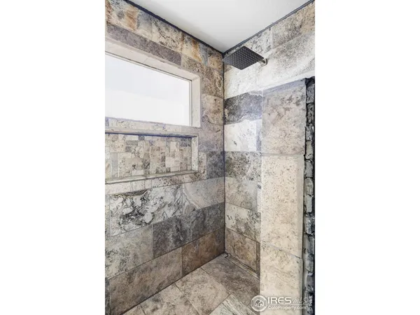 a bathroom with a sink mirror and vanity