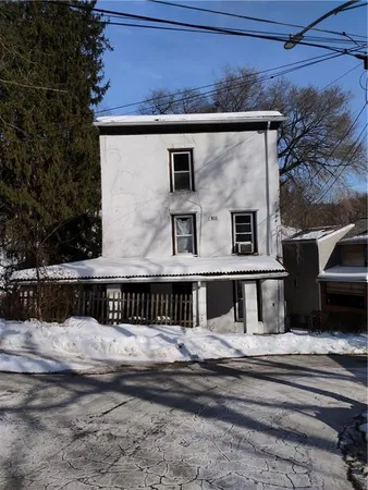 a view of house with outdoor space