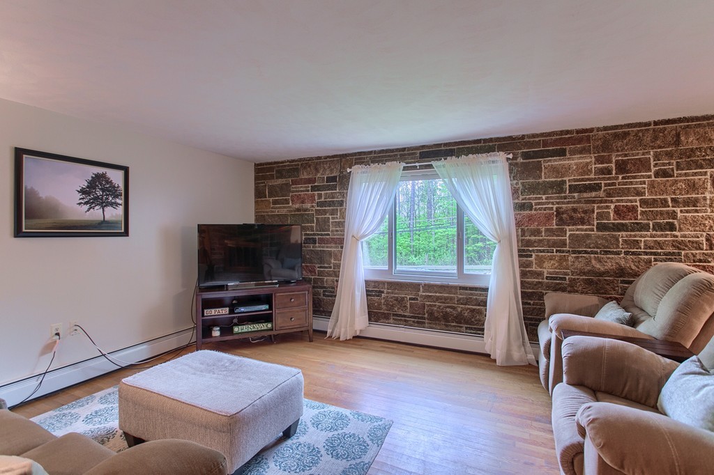 30 Center Street Ashburnham, MA 01430 - Photo 11 of 30 a living room with furniture and a flat screen tv