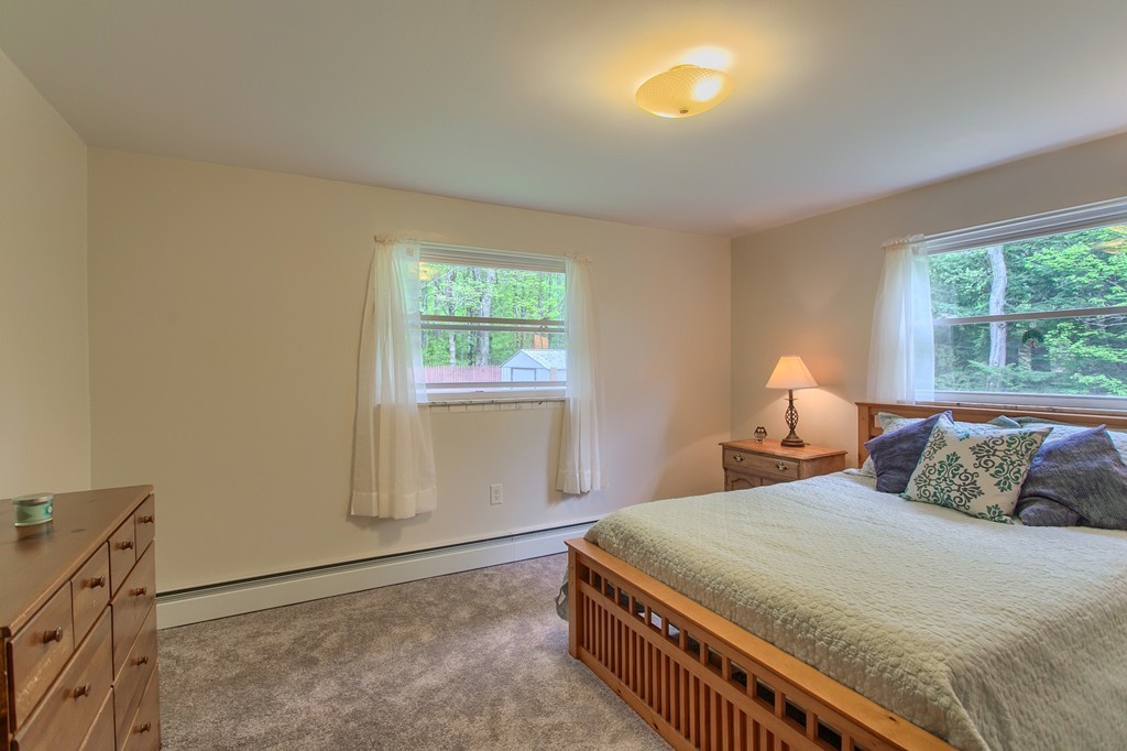 30 Center Street Ashburnham, MA 01430 - Photo 19 of 30 a bedroom with a bed and a window