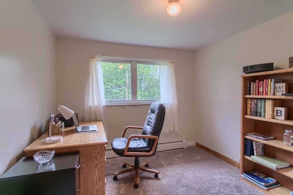 30 Center Street Ashburnham, MA 01430 - Photo 23 of 30 a view of a workspace with furniture and a window