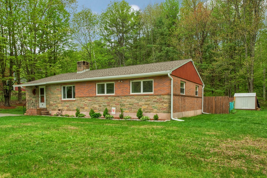 30 Center Street Ashburnham, MA 01430 - Photo 30 of 30 a front view of a house with a yard