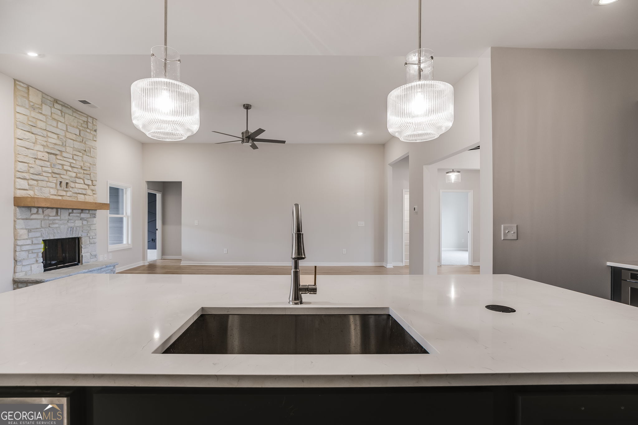 3356 Veal Road Roopville, GA 30170 - Photo 13 of 45 a kitchen with a table and a chandelier
