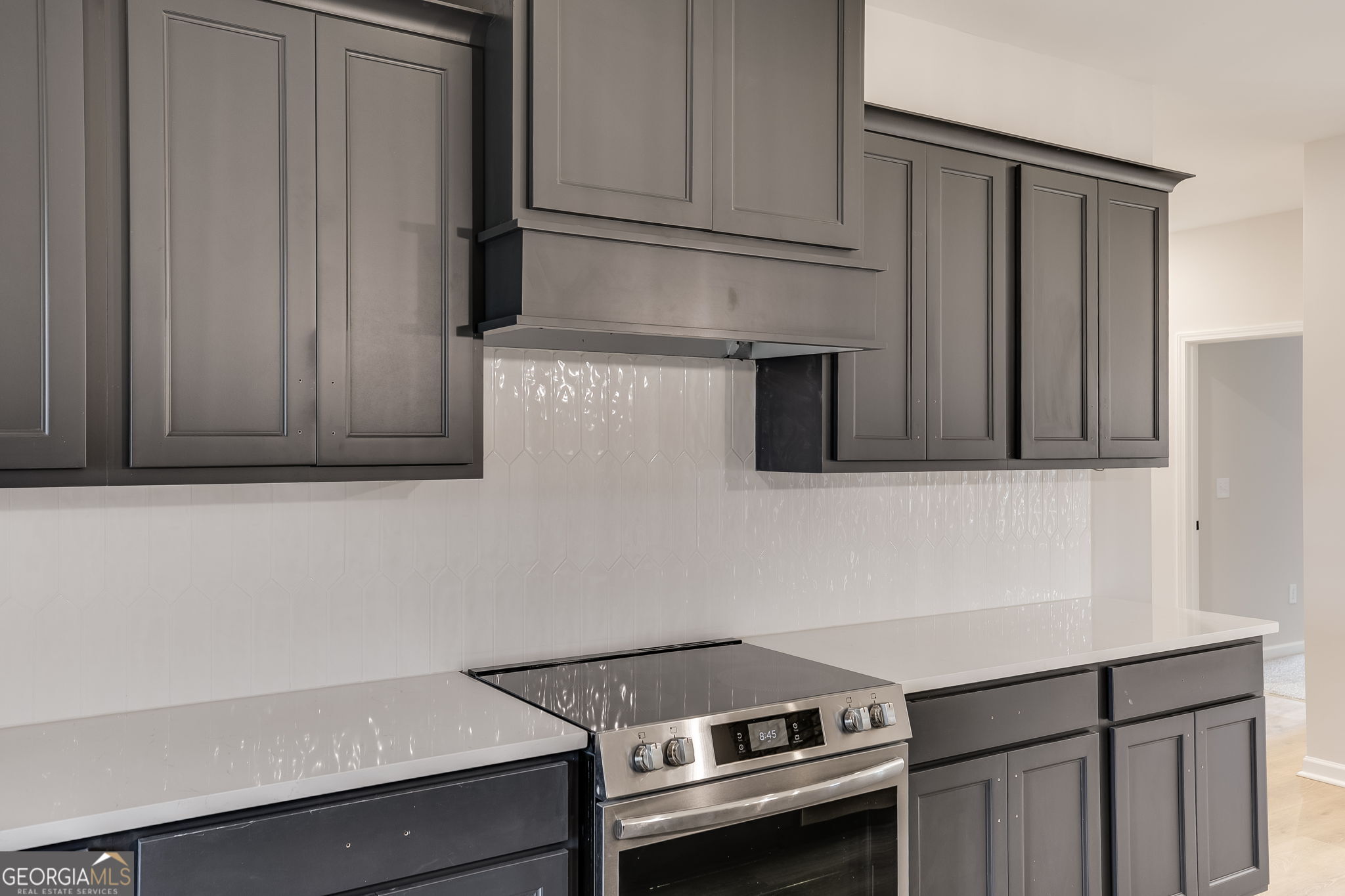 3356 Veal Road Roopville, GA 30170 - Photo 16 of 45 a kitchen with wooden cabinets and a stove