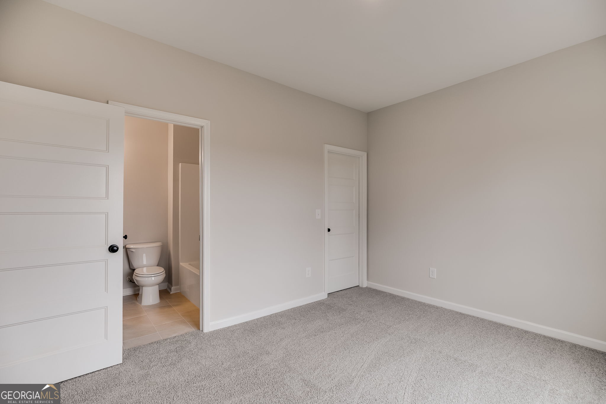 3356 Veal Road Roopville, GA 30170 - Photo 19 of 45 a bathroom with a toilet