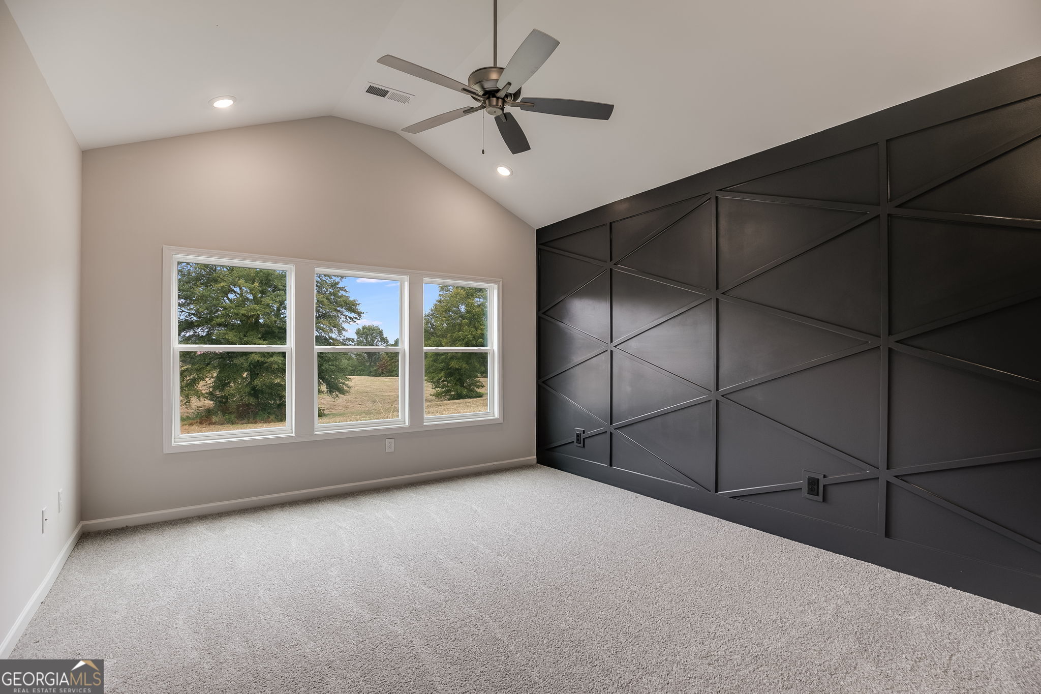 3356 Veal Road Roopville, GA 30170 - Photo 21 of 45 a view of a livingroom with a ceiling fan and window