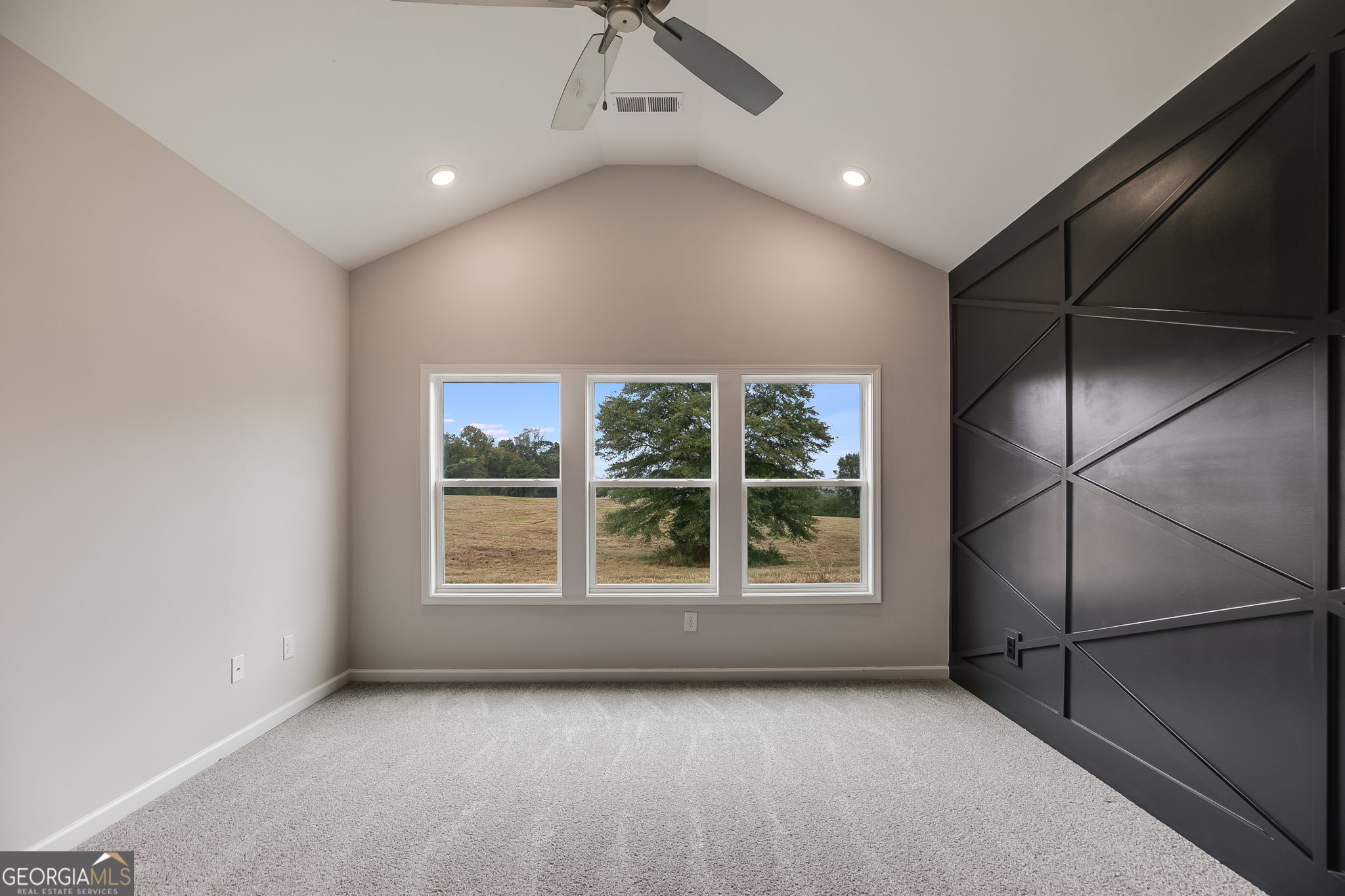 3356 Veal Road Roopville, GA 30170 - Photo 22 of 45 a view of an empty room with a window