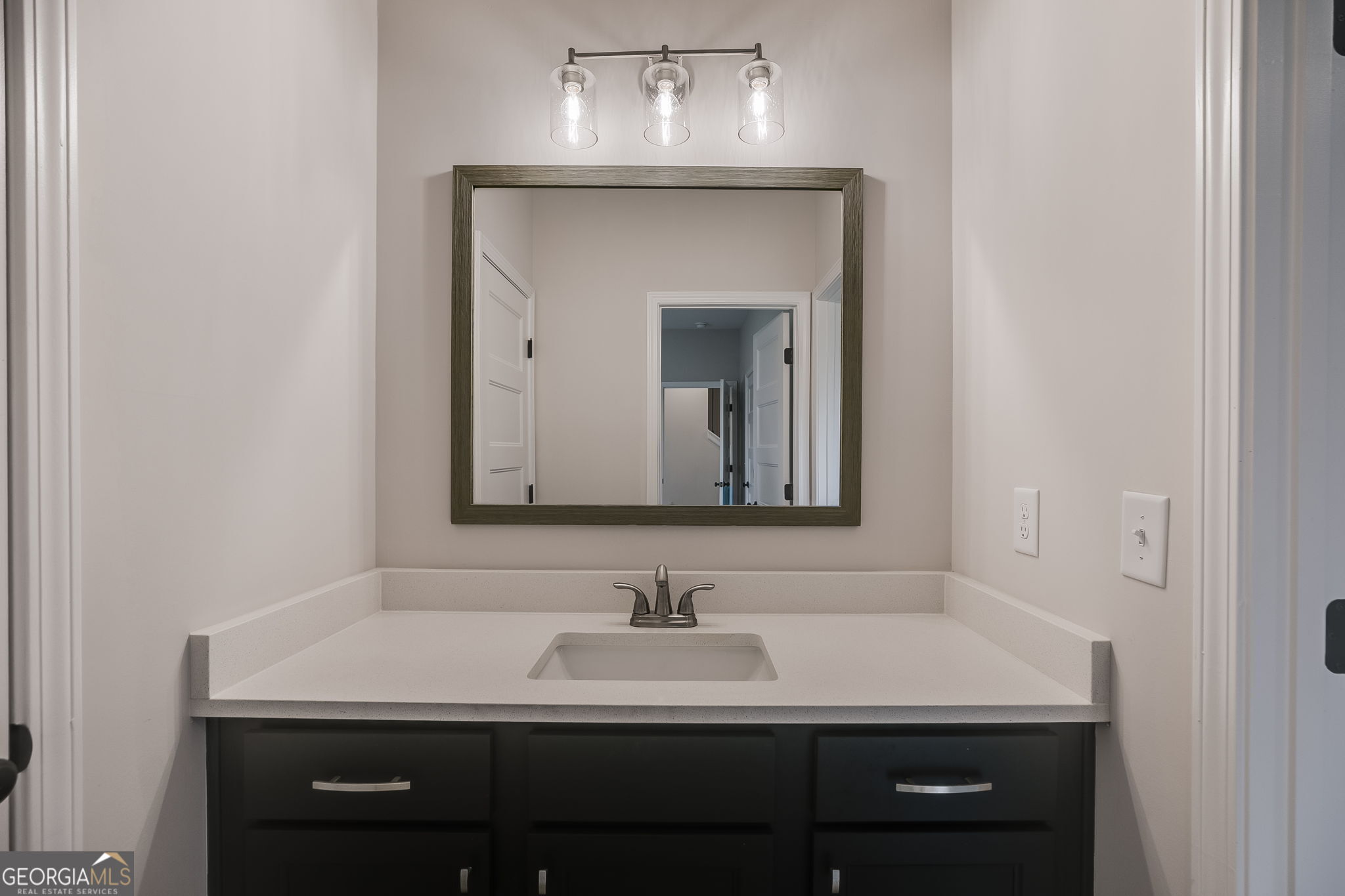 3356 Veal Road Roopville, GA 30170 - Photo 30 of 45 a bathroom with a sink vanity and a mirror