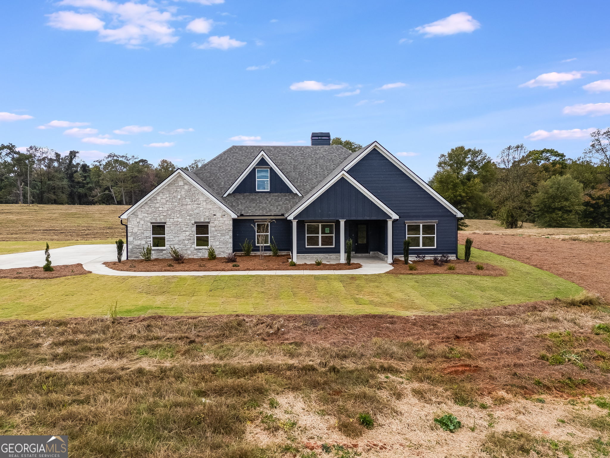 3356 Veal Road Roopville, GA 30170 - Photo 4 of 45 a front view of a house with a yard