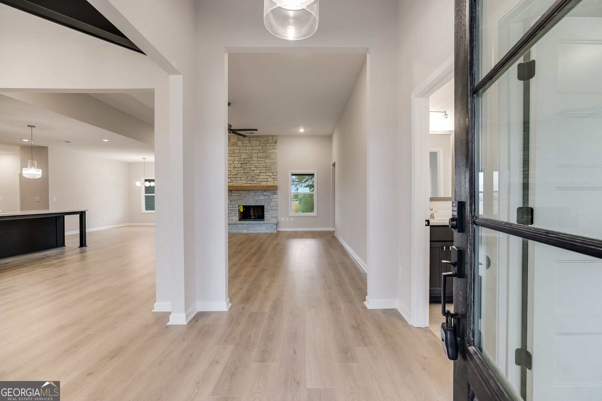 3356 Veal Road Roopville, GA 30170 - Photo 5 of 45 a view of a hallway view with wooden floor and staircase