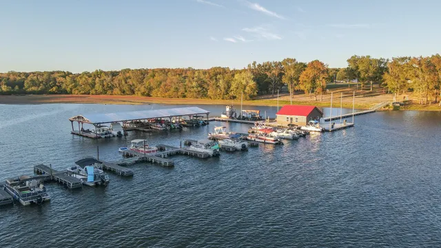 a group of people sitting on a roof deck