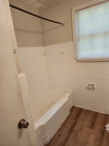 a bathroom with a bathtub