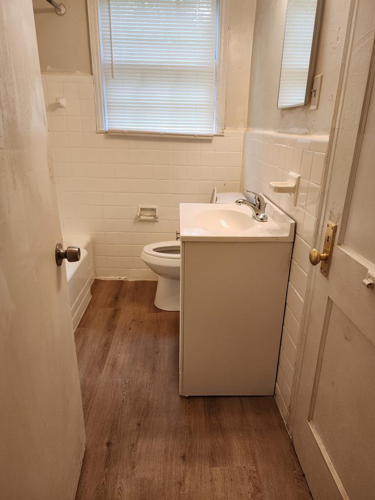 2444 South Lumpkin Road Columbus, GA 31903 - Photo 19 of 21 a utility room with a sink dryer and washer