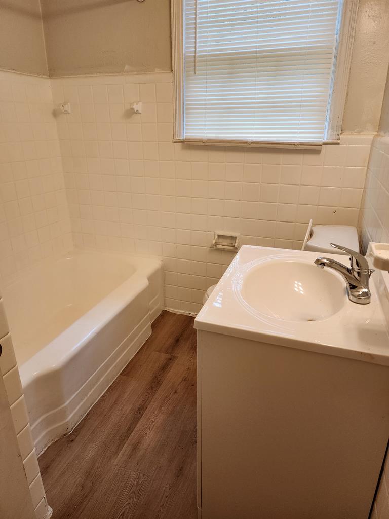 2444 South Lumpkin Road Columbus, GA 31903 - Photo 21 of 21 a bathroom with a sink and a mirror