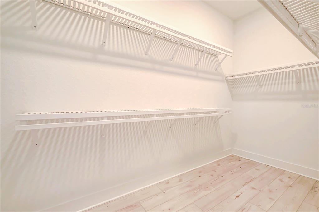 8218 Nevis Run Lakewood Ranch, FL 34202 - Photo 19 of 48 a view of small space with wooden floor