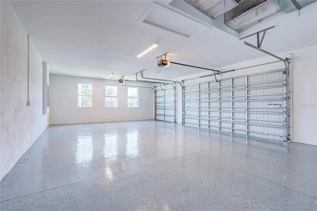 a view of empty room with windows
