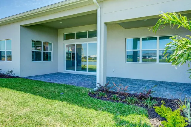 a view of front door of house and yard
