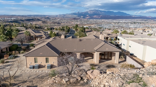 2464 East Granite Way St. George, UT 84790 - Photo 6 of 106 Aerial view of residential area featuring a mountain backdrop
