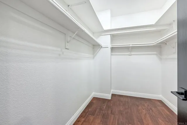 a view of an empty walk in closet