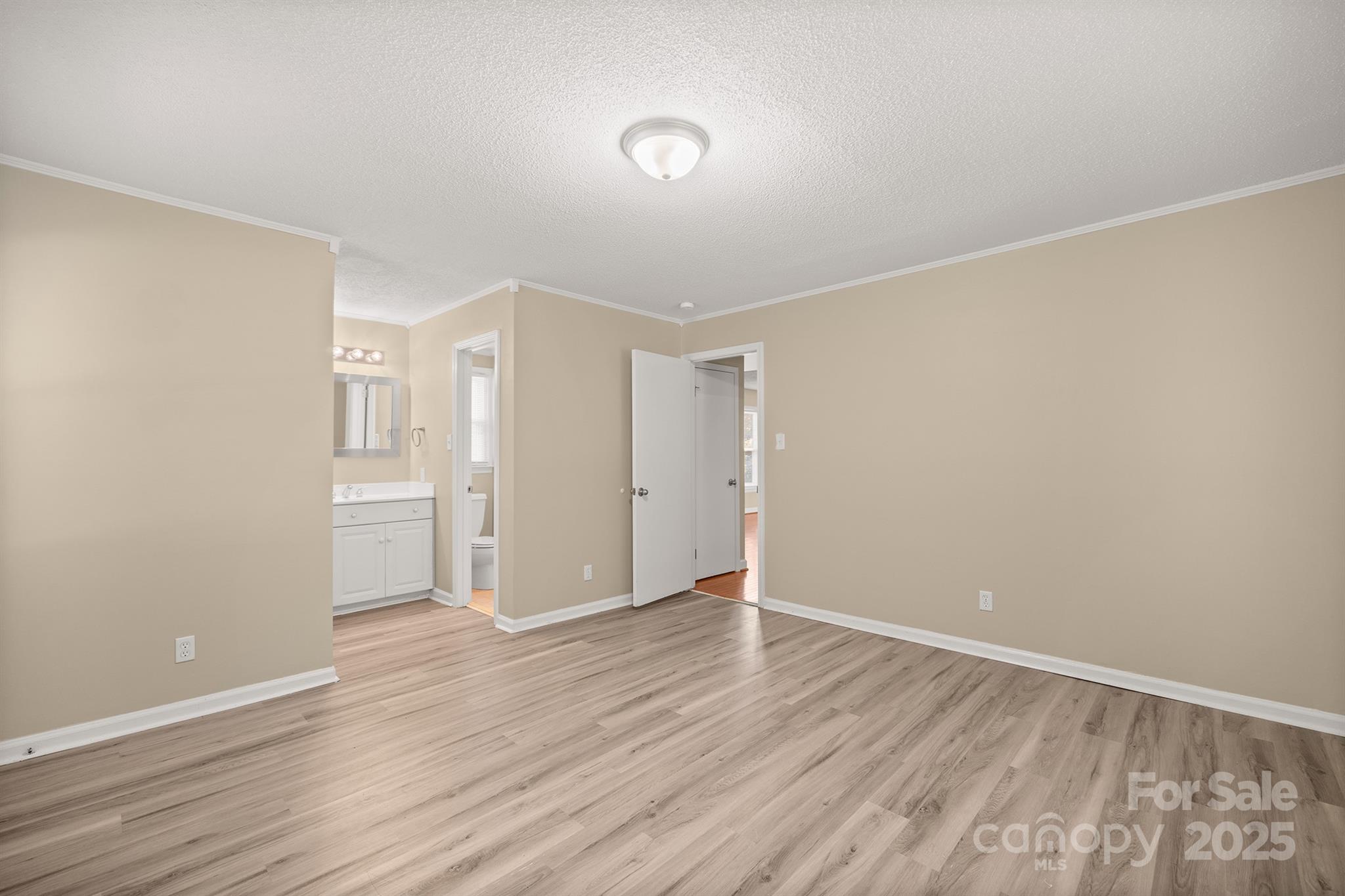 1052 Palmyra Drive Fort Mill, SC 29708 - Photo 15 of 26 a view of an empty room with wooden floor