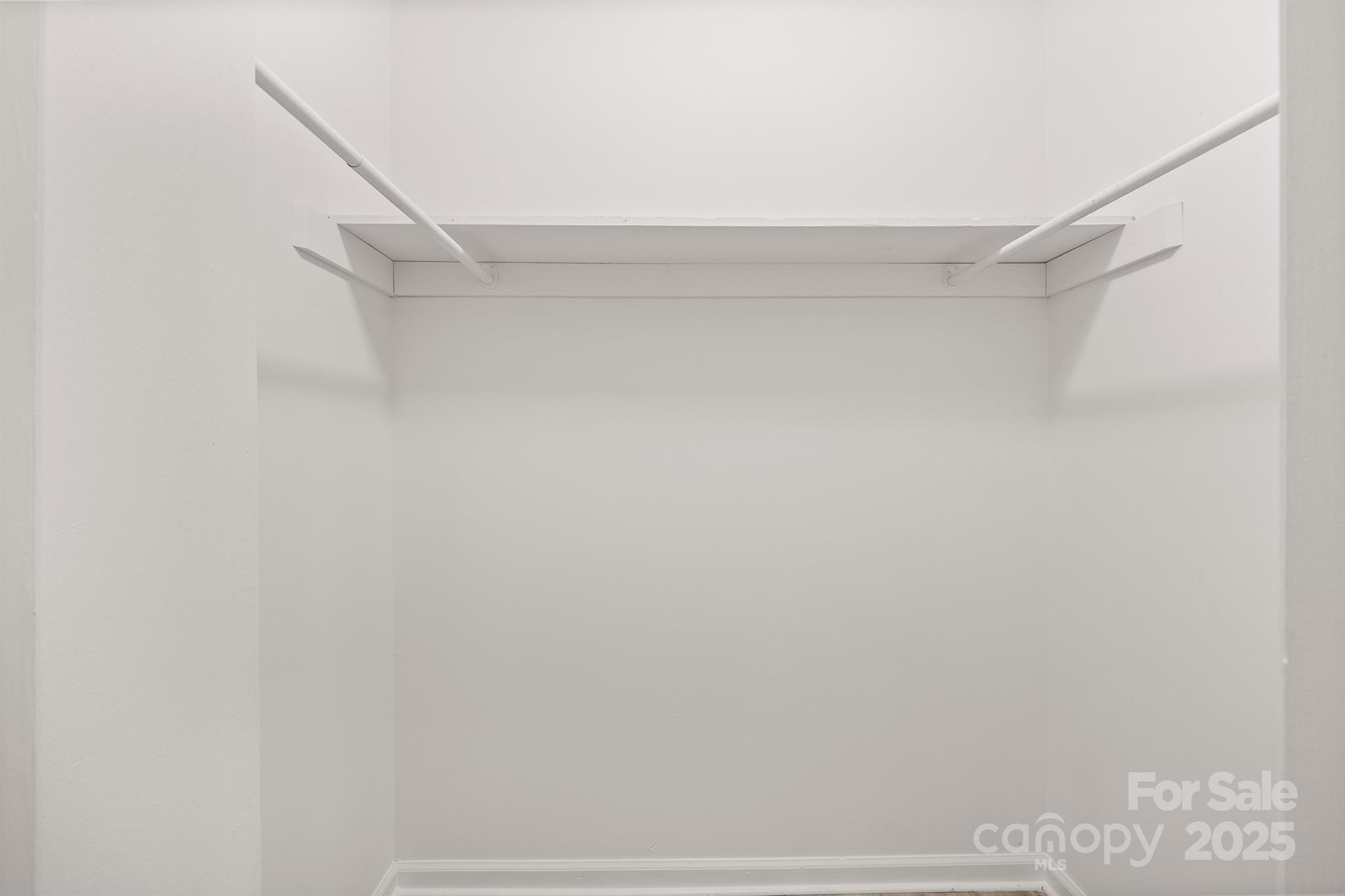 1052 Palmyra Drive Fort Mill, SC 29708 - Photo 18 of 26 a view of walk in closet with empty racks